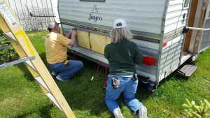 Craig and Barb sealing the rear opening