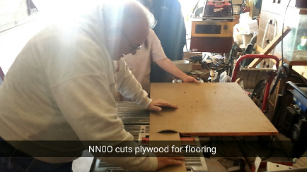 NNØO cutting the new flooring
